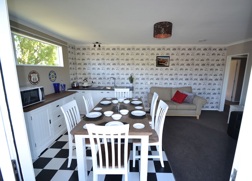 kitchen with microwave and fridge